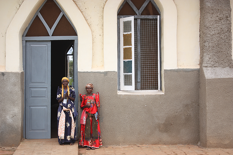 Two parishioners after finishing their rosary at the local church