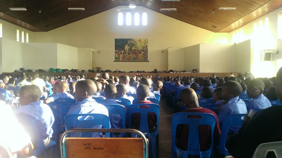 Eleven hundred boys at Catholic Mass on Sunday.