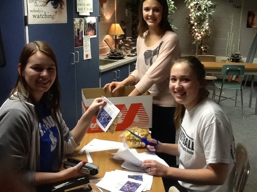 Students at Milton High School planning at bake sale for Allen's education