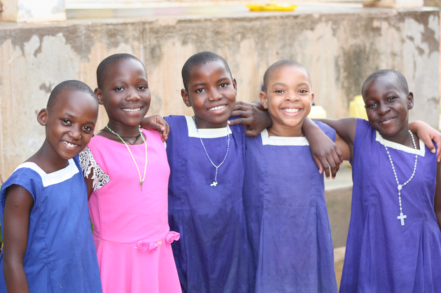 Cleire with her new friends at Stella Maris Boarding School