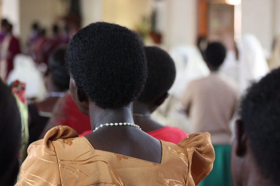 Women wore the traditional dressed-up Ugandan garb, called a gomas