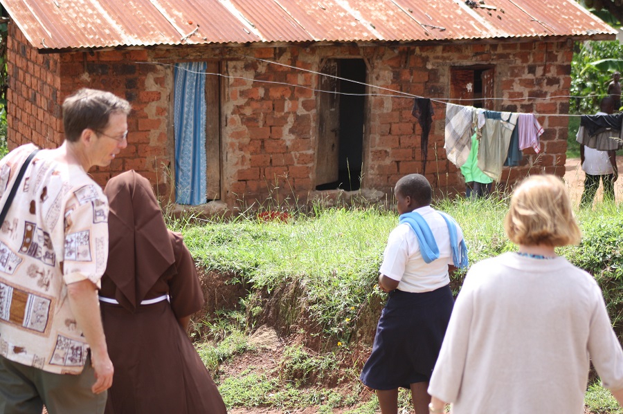 Sr. Florence escorts the visitors to Vanessa's grandmother's home