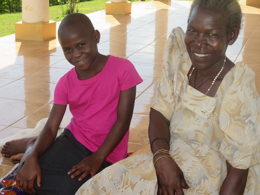 Rita's grandmother wore her gomesi when they came to the CARITAS Learning Center to meet Sr. Carolyne, Uganda Program Coordinator. Rita is sponsored by Kye and Rhonda. 