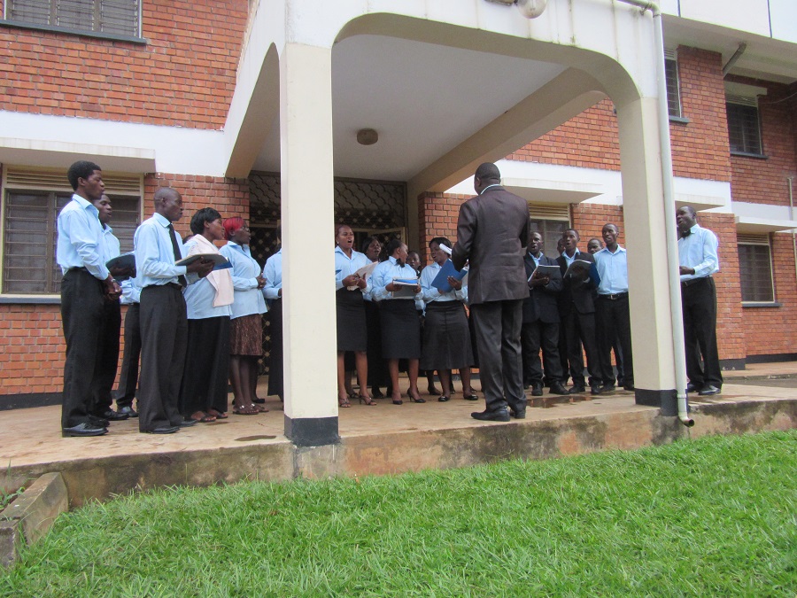 The Namilyango Choir sings on the veranda. They presented a beautiful version of the Hallelujah Chorus from Handel's Messiah. 