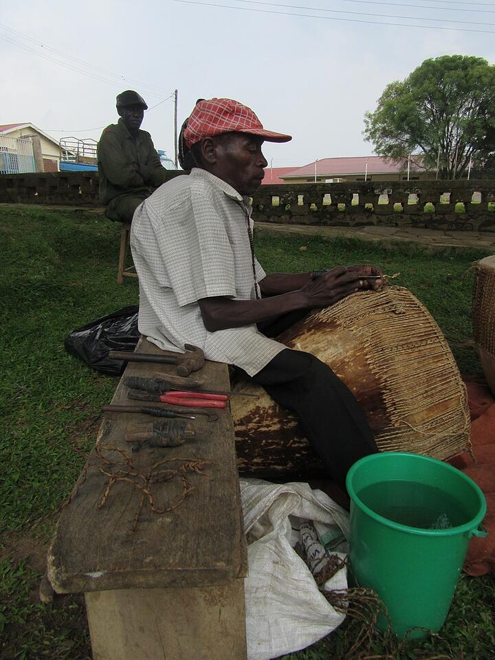 To work on the drums, the artisan uses a variety of tools, including a hammer, pliers, and several picks. To work on the drums, the artisan uses a variety of tools, including a hammer, pliers, and several picks.