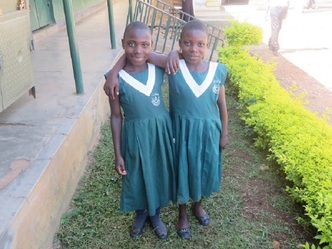 Zuluka and Masane are sisters who appear to have different last names to those unfamiliar with Ugandan naming convention.